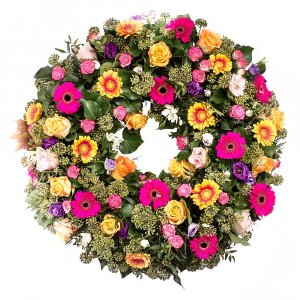 Coloured Roses and mini Gerbera funeral wreath